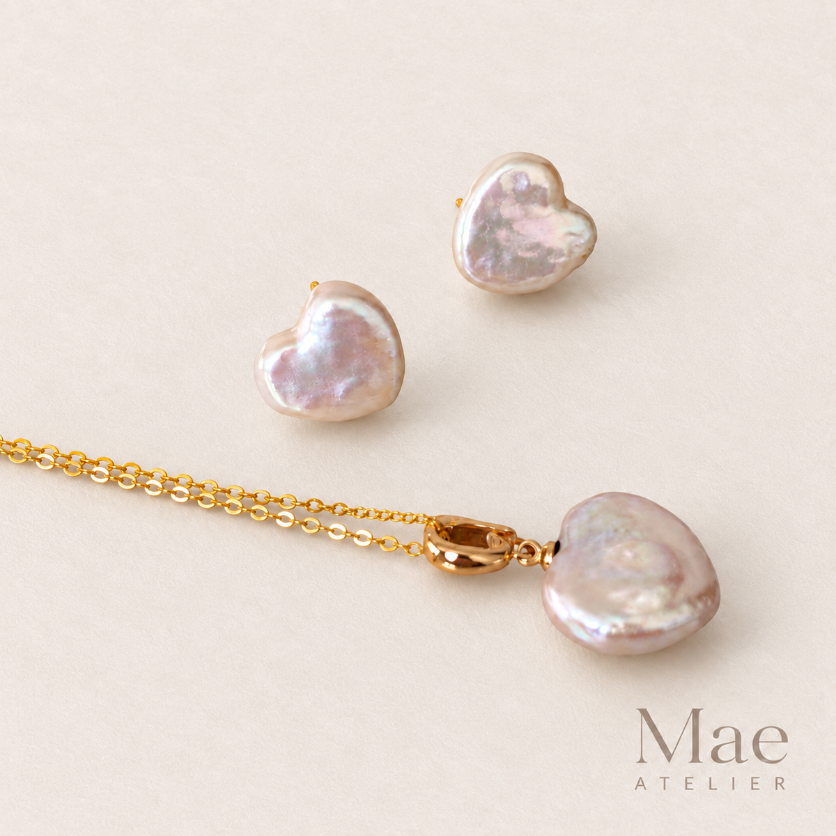 Heart-shaped natural freshwater baroque pearl pendant with 18K gold plated bail