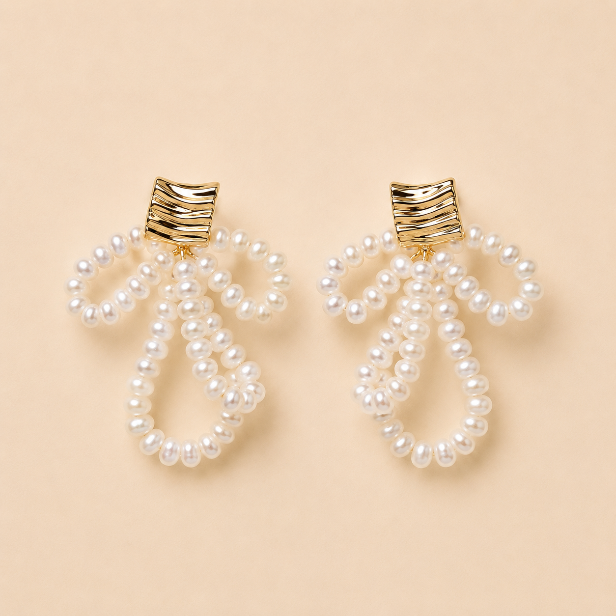 Golden Sonata Pearl Bow Earrings