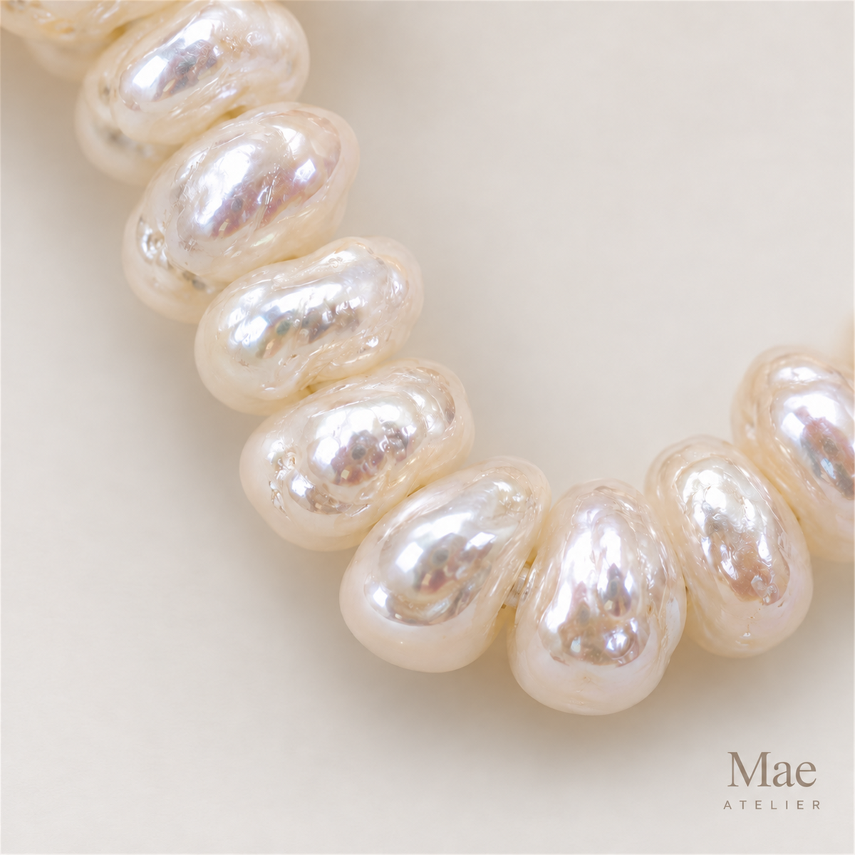 Aurora Pearl Loop Statement Earrings — pearl detail