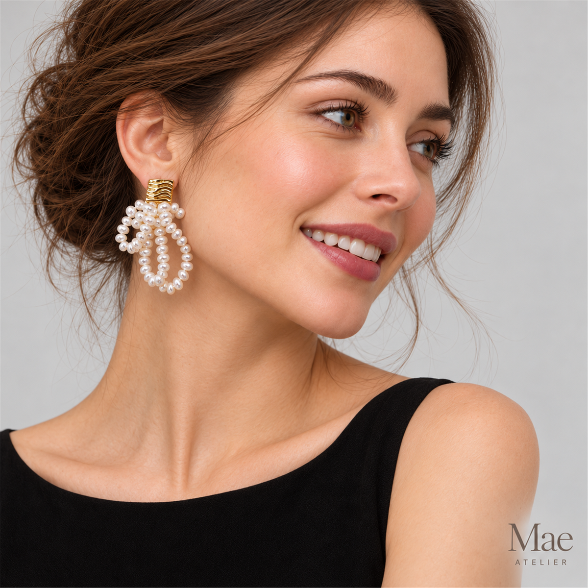 Aurora Pearl Loop Statement Earrings — model wearing the jewelry
