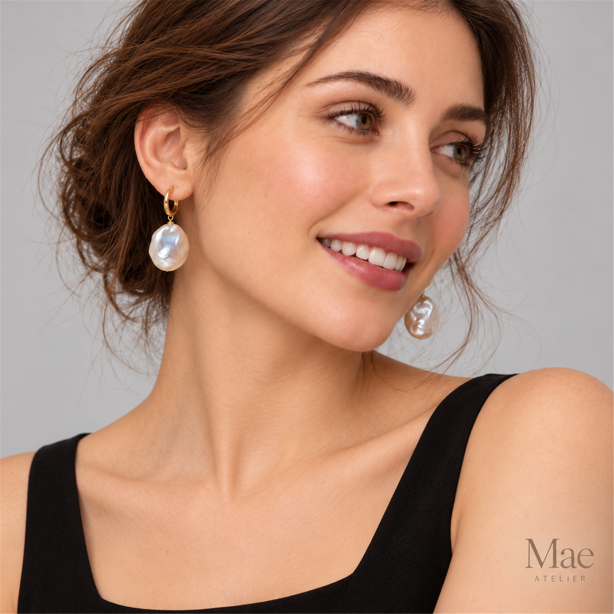 Baroque Pearl Drop Hoop Earrings – Gold Huggies, Large Iridescent Pearls — model wearing the jewelry