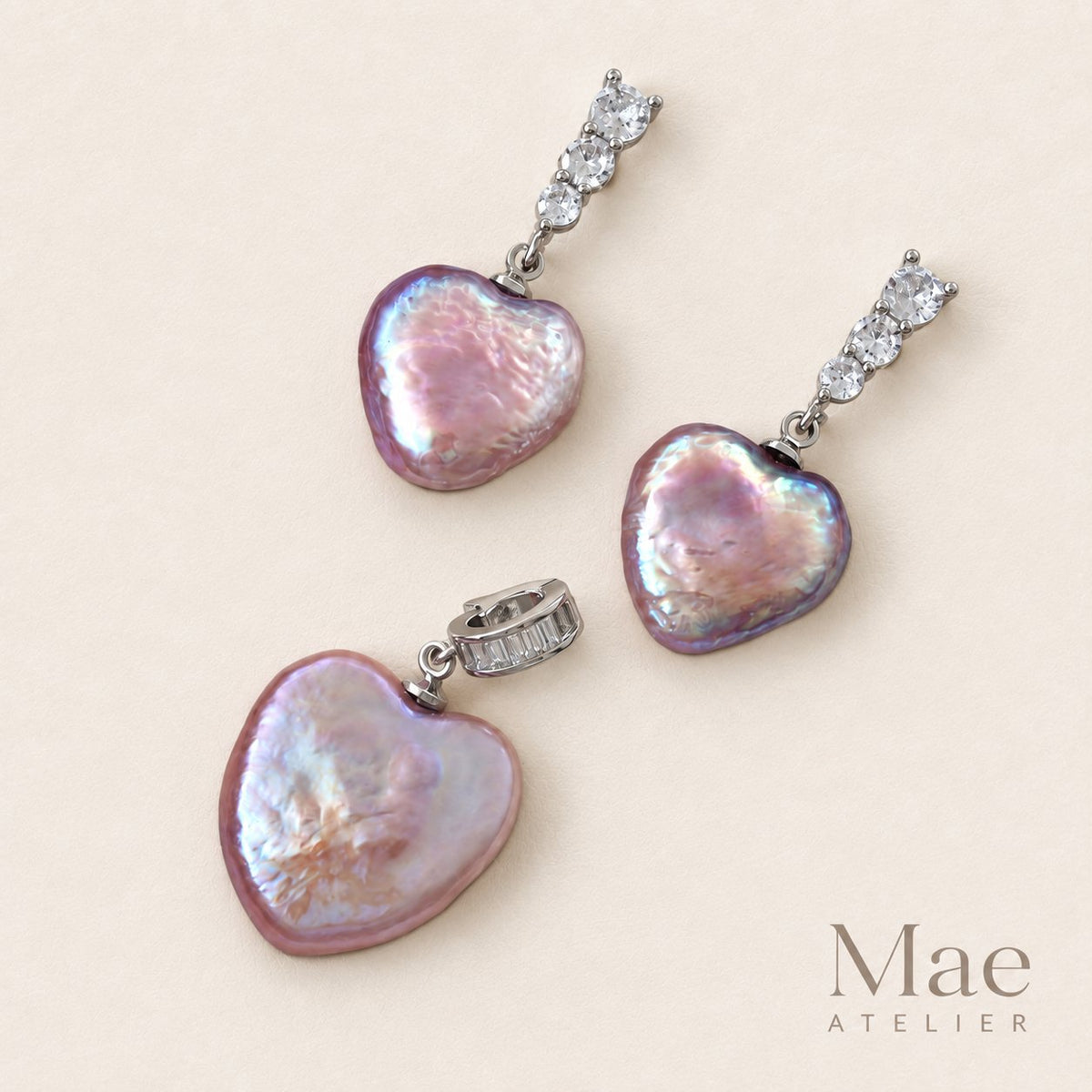 Purple heart freshwater pearl drop earrings with cubic zirconia